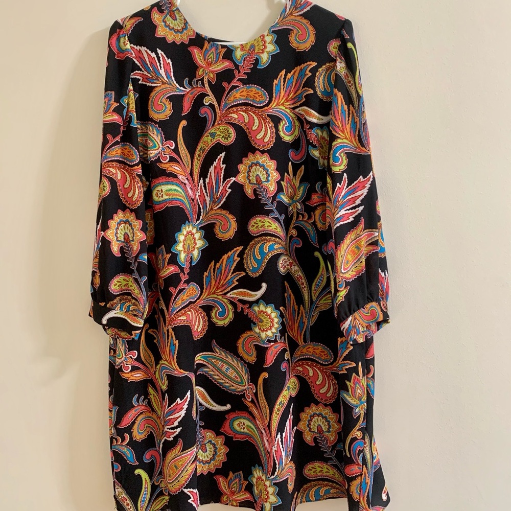 Black sheath dress with bold paisley print.